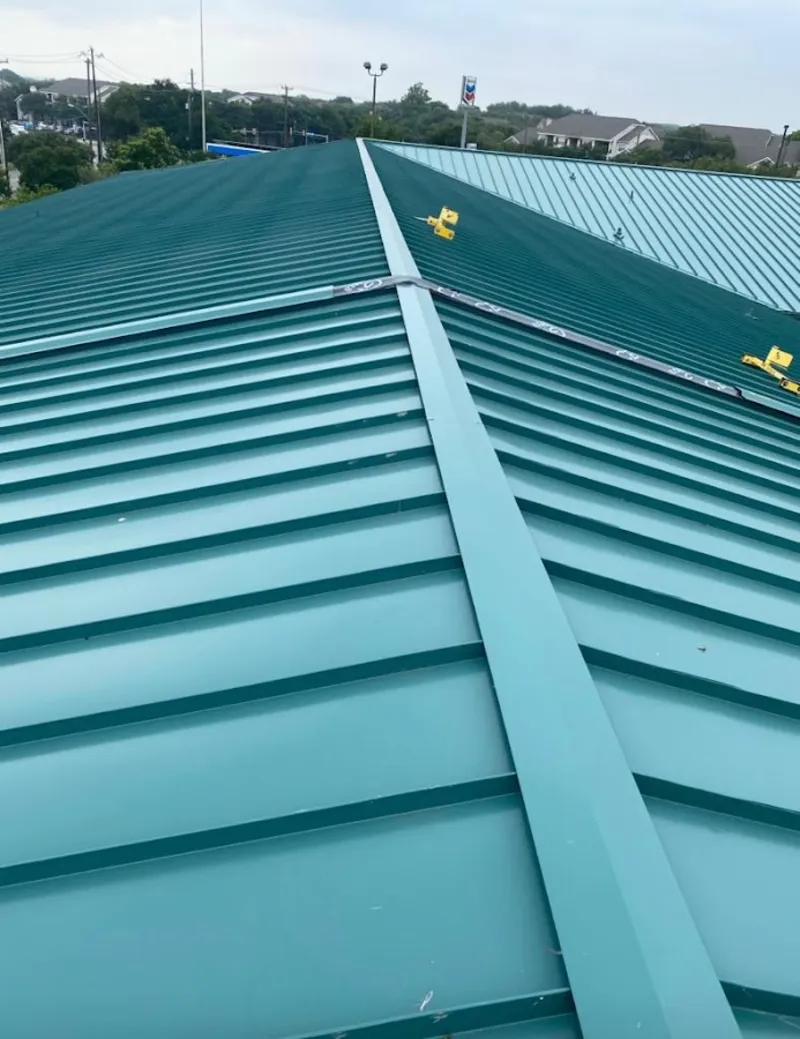 Green commercial metal roof ridge and valley for Metal Roof Repair in Bow